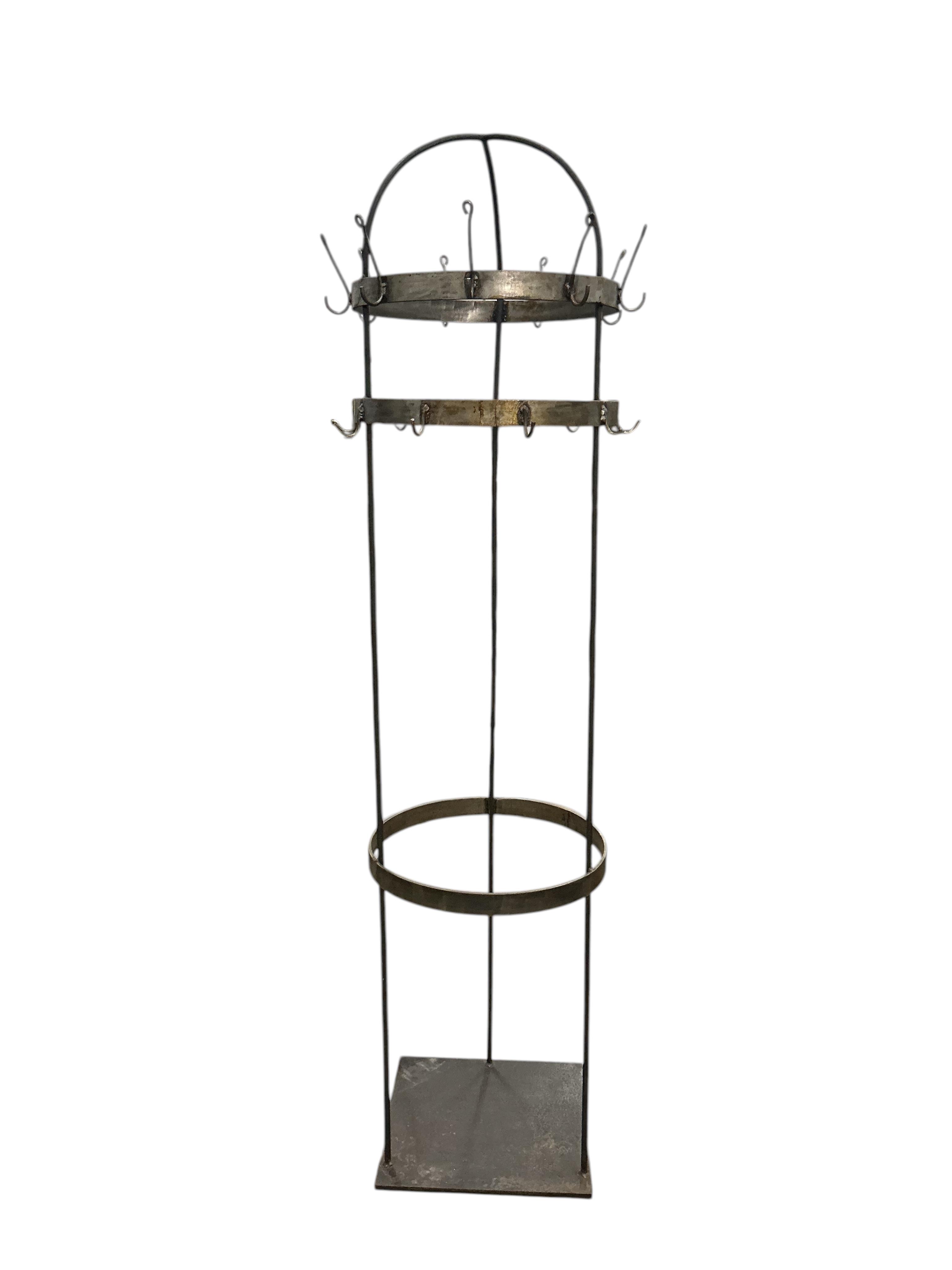 A circular wrought iron hall stand, diameter 45cm, height 184cm